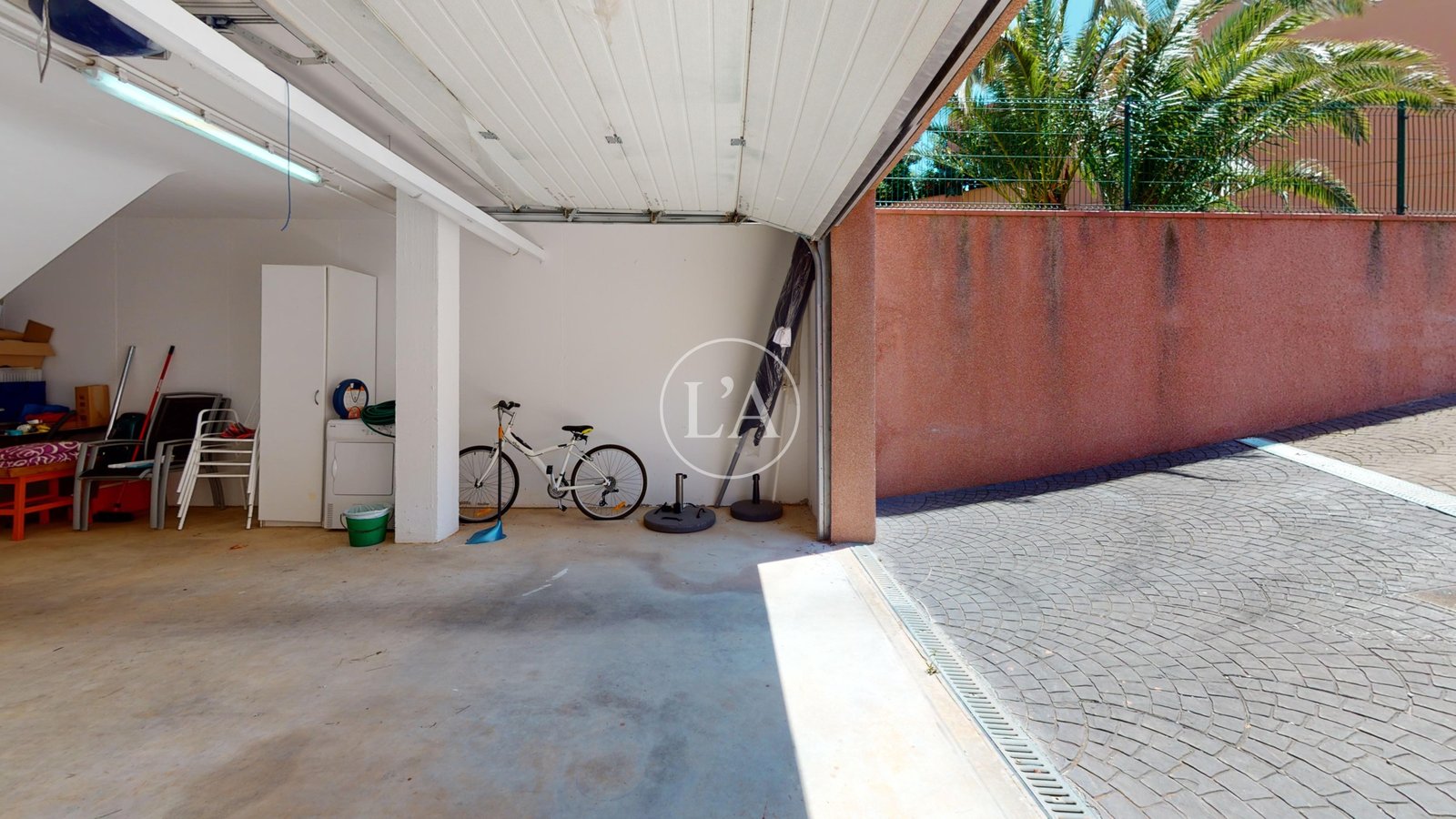 Casa Golf Bonmont puerta garaje