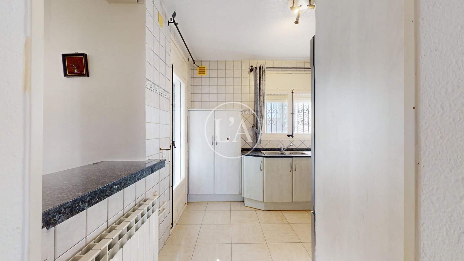 Casa en venta Cambrils Mediterrani entrada cocina