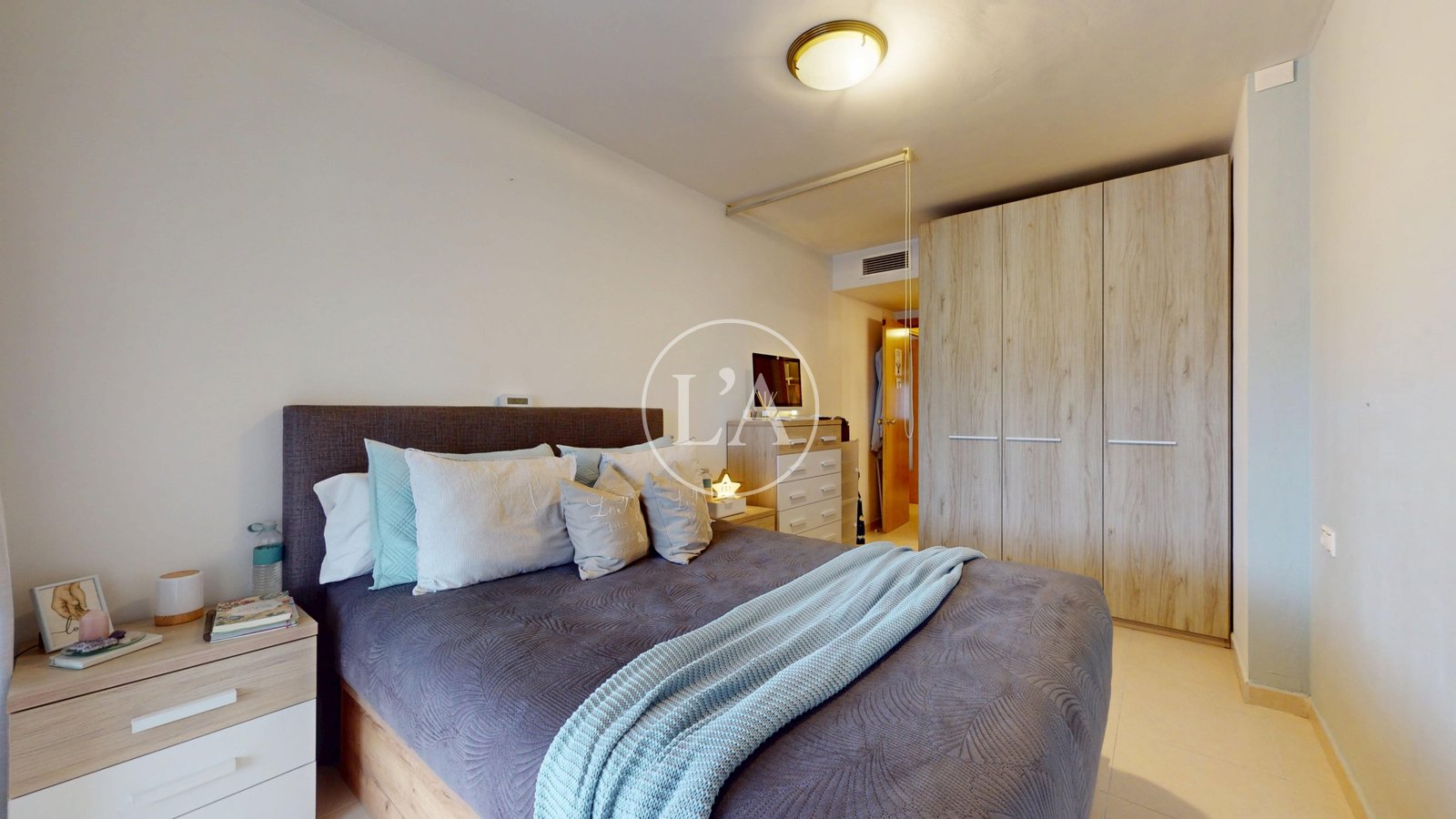 Piso en venta en Cambrils cama dormitorio