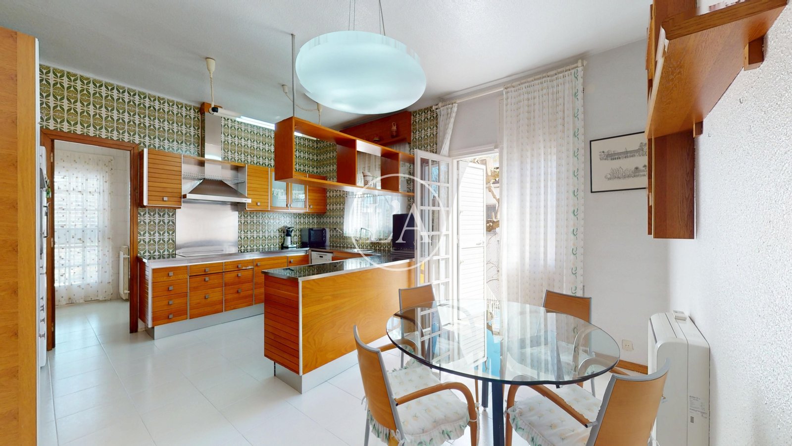 Casa unifamiliar exclusiva en Cambrils cocina salón