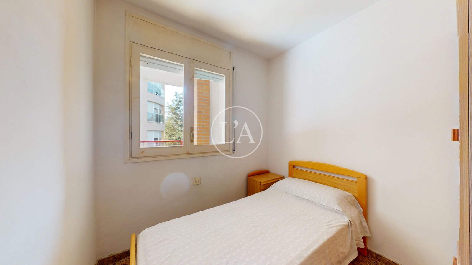 Piso de cuatro habitaciones en Cambrils habitación