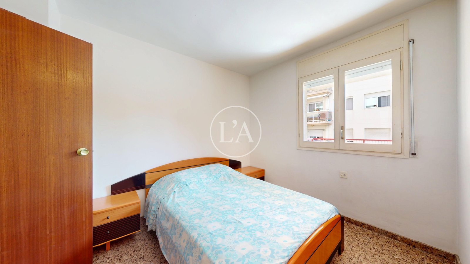 Piso de cuatro habitaciones en Cambrils cama